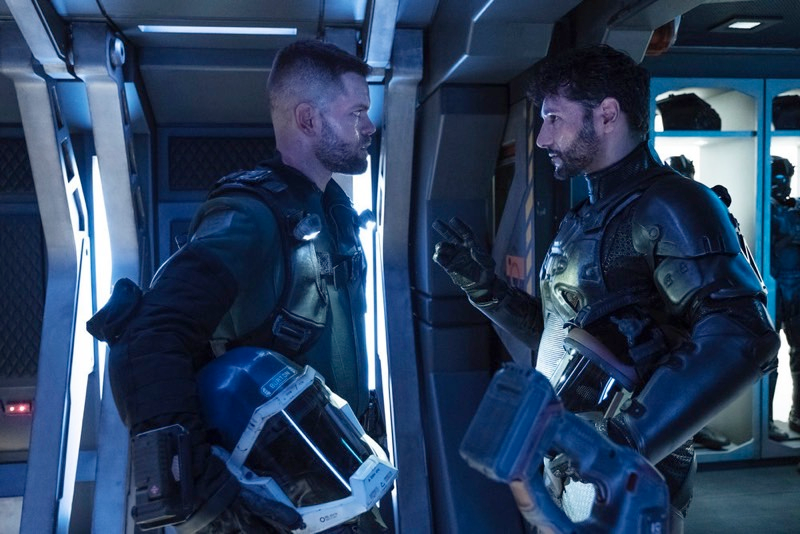 Rocinante mechanic Amos (Wes Chatham) and pilot Alex (Cas Anvar) don’t always see eye to eye.